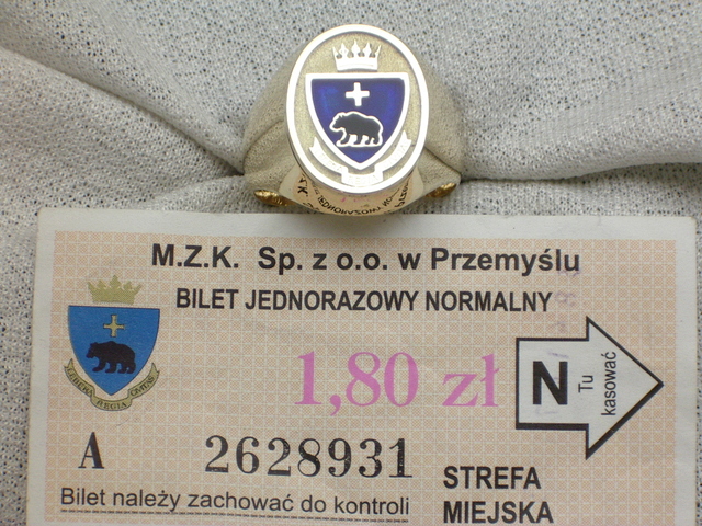 7 Sygnet z herbem miasta.