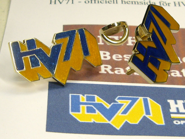 9 Złota przypinka szwedzkiej drużyny hokeja na lodzie.