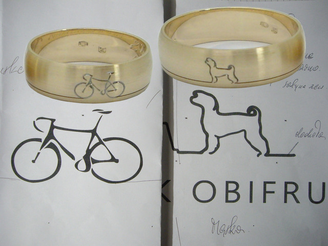 21 Obrączki rower i pies. Wykonane według wzoru Klienta.
